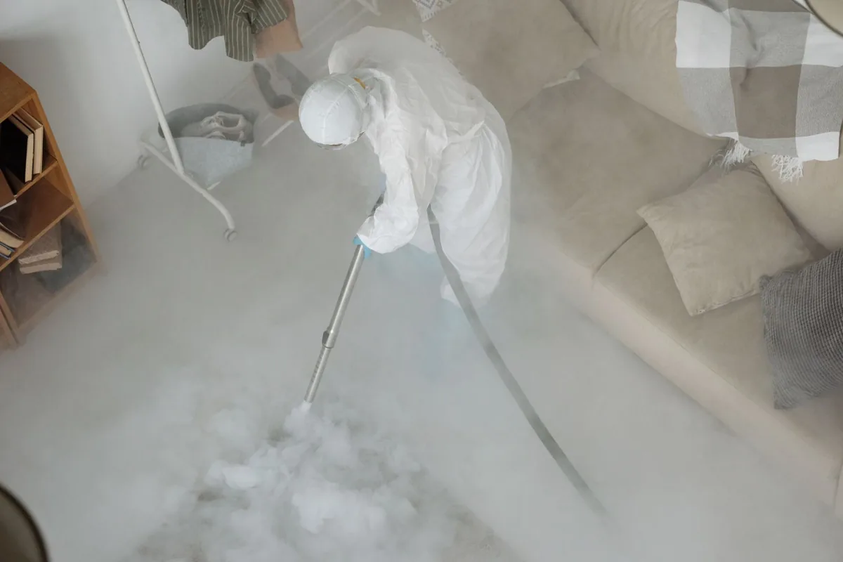 Biohazard cleanup technician in protective equipment, Girard Estates, Philadelphia, PA